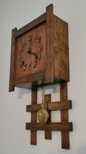 lot 25 image: Vintage Wood- ArtsCrafts Style  Sessions Wall Clock