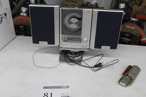 lot 81 image: The Sharper Image Vertical CD Stereo with Digital Tuner SO226 with Remote Control