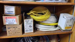 lot 365 image: Electrical Lot - Shelf of Romex Wire and More