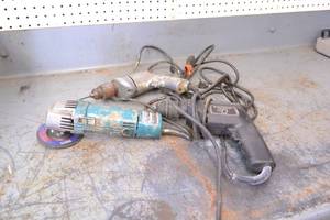 lot 71 image: Makita Angle Grinder and (2) Power Drills