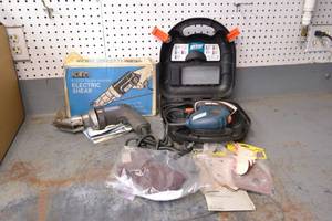 lot 82 image: KETT K-200 Electric Shear and Black and Decker MOUSE Sander