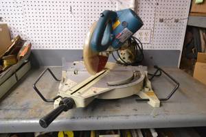 lot 131 image: Makita LS1013 Sliding 10 Miter Saw