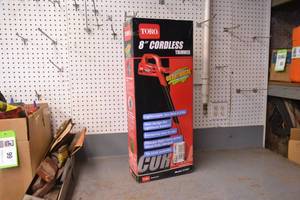lot 134 image: New Toro Model 51467 Cordless Weed Trimmer