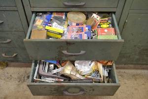 lot 150 image: Contents of (2) Drawers - Shelf Brackets, Staples and Much More