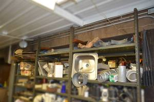 lot 378 image: Plumbing Lot - (6) Shelves of Copper Tubing, Pipe Fittings, Stainless Bar Sink and More