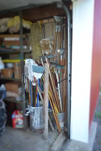 lot 442 image: Corner of Mop Handles, Replacement Broom Handles and More