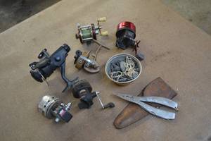 lot 18 image: Lot of 6 Vintage Fishing Reels, Lead Weights, and Fishermans Friend Pliers