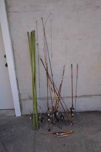 lot 19 image: Large lot of Fishing Poles & Cane Poles