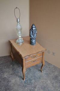 lot 108 image: End Table with Drawers, Table Lamp, and Sculpture