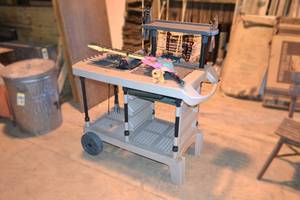 lot 150 image: Rolling Potting  Gardening Bench w Supplies