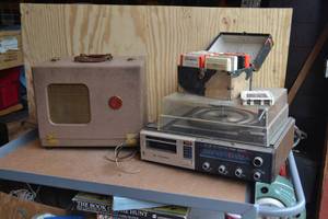 lot 239 image: Vintage Entertainment Lot - Projector, Turntable, 8-Track Player, and 8-Track Tapes