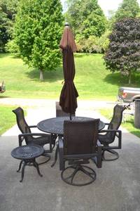 lot 11 image: Tropitone Patio Table with Umbrella Stand & Umbrella, 4 Chairs, and a Small Table