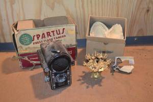 lot 409 image: Spartus Flash Camera, Cocktail Swords, and Plaster Mouth Impressions