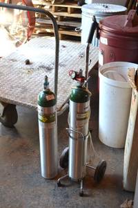 lot 413 image: (2) Small Oxygen Tanks and Cart