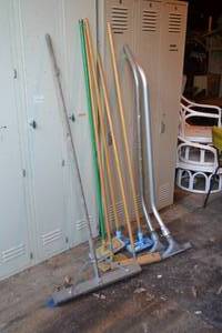 lot 45 image: Lot of Pole Scrubbers, Clarke Vacuum Wands, Push Broom and More