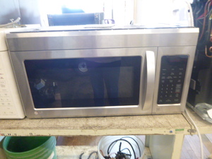 lot 6 image: LG Over Range Microwave