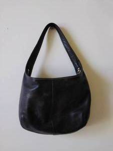 lot 49 image: Black Leather Coach Purse