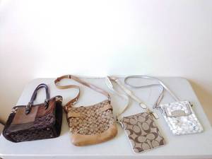 lot 51 image: Four Coach Logo-Patterned Purses