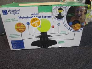 lot 69 image: GeoSafari Motarized Solar System...