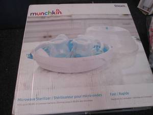 lot 72 image: Munchkin Microwave Sterilizer...