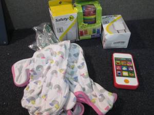 lot 74 image: SM Swaddle Me, 2 Safety 1st Outlet...