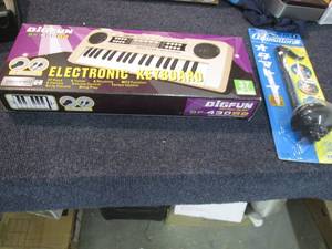 lot 96 image: Electronic Keyboard, Otamatone...