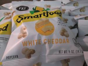 lot 129 image: Case of 72 - 12 oz Bags Smartfood ...