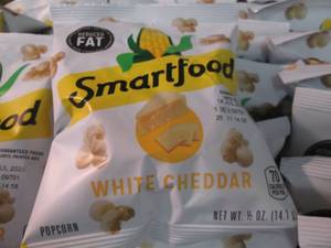 lot 130 image: Case of 72 - 12 oz Bags Smartfood ...