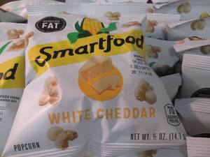 lot 131 image: Case of 72 - 12 oz Bags Smartfood ...
