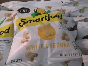 lot 132 image: Case of 72 - 12 oz Bags Smartfood ...