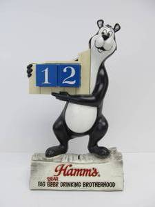lot 160 image: Vintage HAMMS Bear Calendar Bank (AS IS)