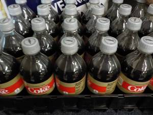 lot 213 image: Case of 24 Bottles Caffeine Free Di...