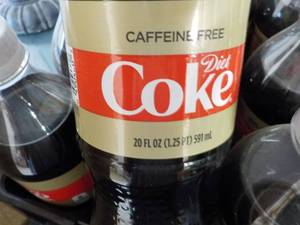 lot 215 image: Case of 24 Bottles Caffeine Free Di...