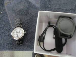 lot 25 image: Iconnect by Timex Watch black and M...