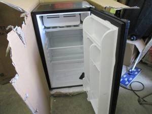 lot 33 image: RCA 3.2 cu ft Mini Refrigerator do...