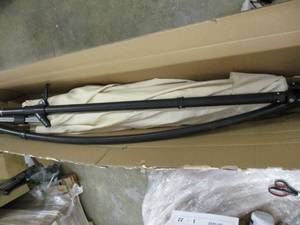 lot 50 image: Patio Umbrella not sure if all the...