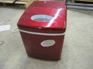 lot 66 image: NewAir Portable Ice Maker powers o...