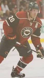lot 7 image: RYAN SUTER Autographed Photo
