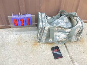 lot 20 image: New cammo bag. As shown.