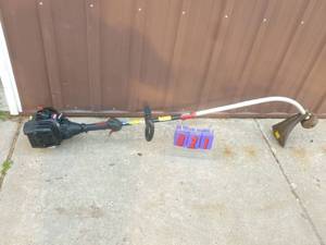 lot 21 image: Craftsman 2 cycle weed trimmer. Lightly used. Tested & works. As shown.