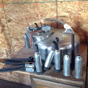 lot 63 image: Vintage Milking Equipment