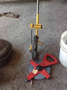lot 90 image: 300 Tape & Measuring Wheel
