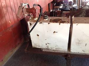 lot 153 image: Gasoline Tank With Pump