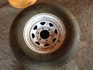 lot 156 image: New ST22575R15 Tire & Rim