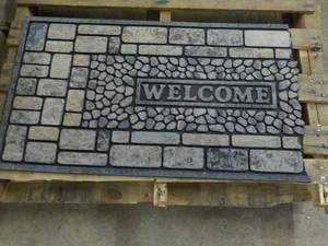 Welcome Mat damaged on 1 end...