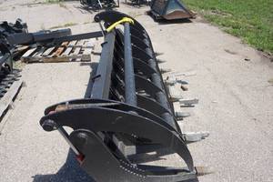 lot 10 image: Brand New Universal Mount Bobcat Skid Loader Skid Steer 84 Root Rake Grapple Bucket