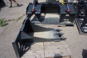 lot 15 image: Brand New Universal Mount Bobcat Skid Loader Skid Steer Stump Bucket With Teeth