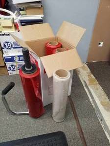 lot 145 image: Uline Color Tinted Stretch Wrap Dispenser and Stretch Wrap Rolls S-2900