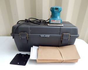 lot 14 image: Makita Finishing Sander with Plano Toolbox and Sandpaper
