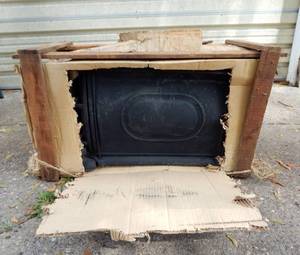 lot 135 image: Menards Cast Iron Stove Box Heater